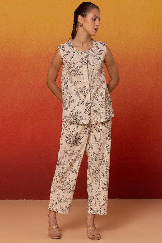 Sleeveless black leaf print cotton coord set, round neck top, and straight-fit pants
