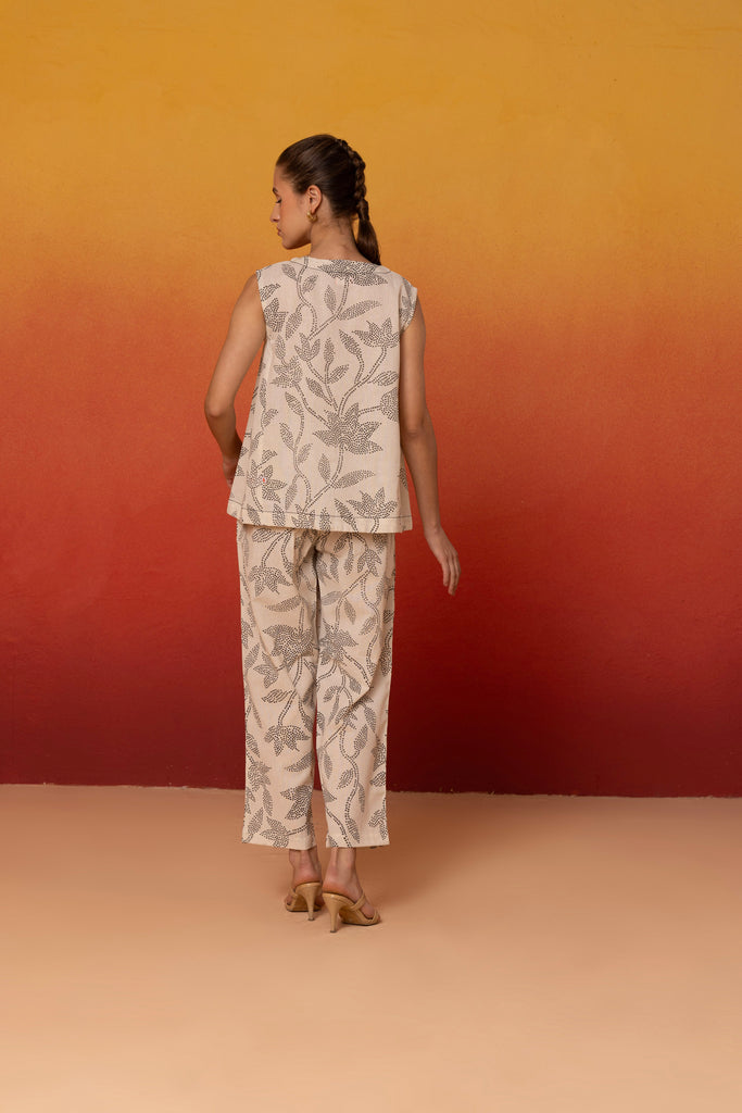 Sleeveless black leaf print cotton coord set, round neck top, and straight-fit pants