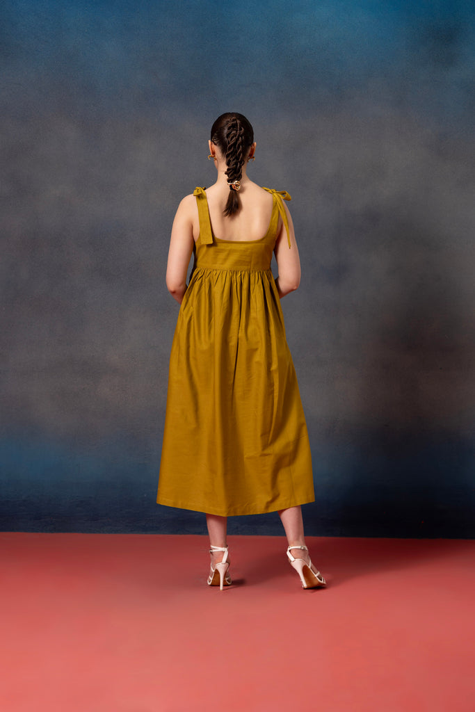 Lime Green color sleeveless Midi Dress with blue floral patch on the dress along with sqaure neck detailing 