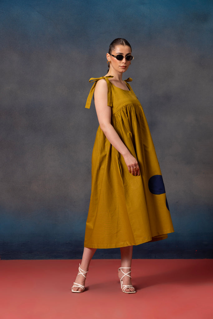 Lime Green color sleeveless Midi Dress with blue floral patch on the dress