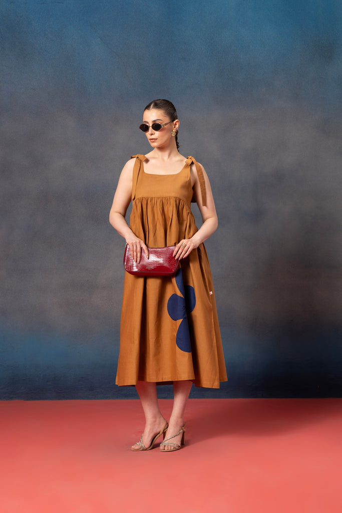 sleevless mustard yellow knee length midi dress for women 
